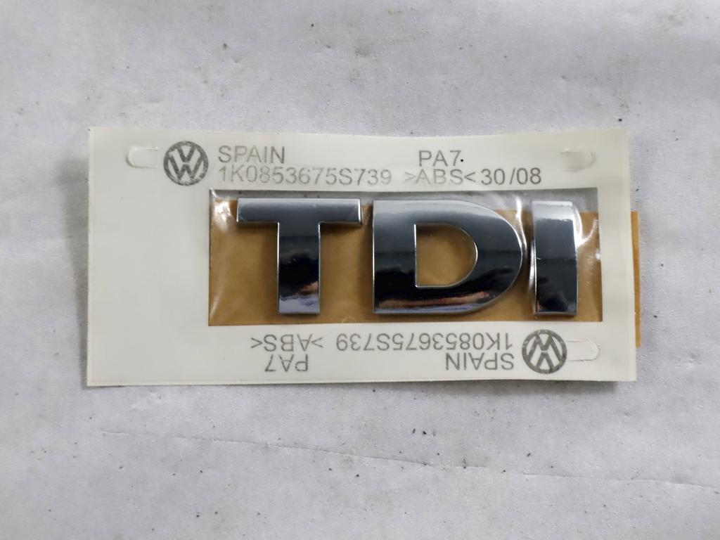 1K0853675S STEMMA FREGIO LOGO EMBLEMA "TDI" PORTELLONE COFANO POSTERIORE BAULE VOLKSWAGEN GOLF 5 1.9 D 77KW 5M 5P (2005) RICAMBIO NUOVO