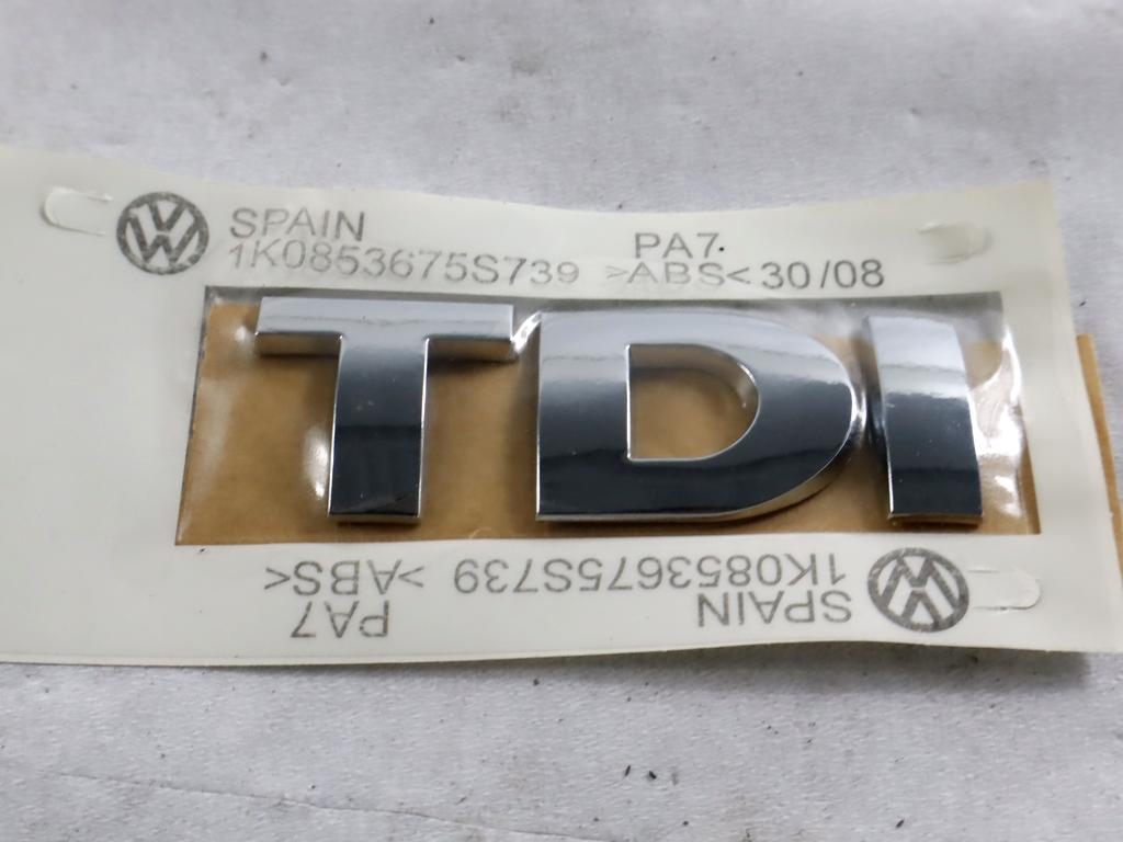 1K0853675S STEMMA FREGIO LOGO EMBLEMA "TDI" PORTELLONE COFANO POSTERIORE BAULE VOLKSWAGEN GOLF 5 1.9 D 77KW 5M 5P (2005) RICAMBIO NUOVO